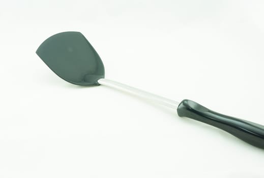 Kitchen spatula, kitchen utensil, the scoop and handle made plastic, the center shaft made from stainless steel.                                 