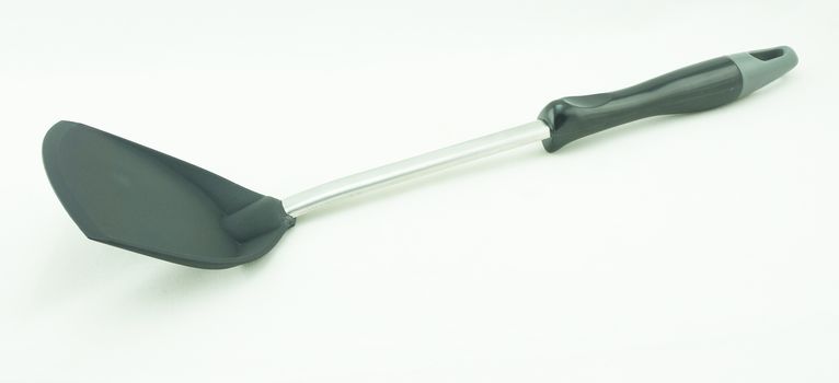 Kitchen spatula, kitchen utensil, the scoop and handle made plastic, the center shaft made from stainless steel.                               