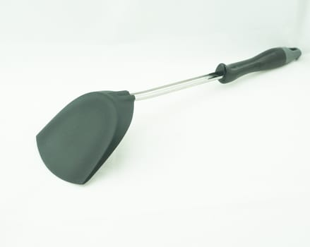 Kitchen spatula, kitchen utensil, the scoop and handle made plastic, the center shaft made from stainless steel.                                