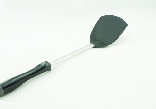 Kitchen spatula, kitchen utensil, the scoop and handle made plastic, the center shaft made from stainless steel.                                