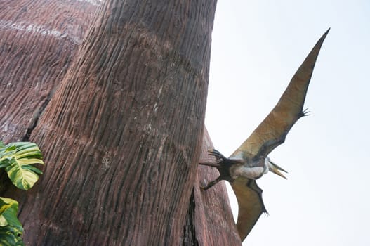 The Bird statue is show that it has spread the wings for forage some food outside the cave, this statue is at the zoo in Thailand.                       