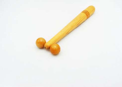 Wood for facial massage, a long stick that fits the hand. Side is a device made of polished stone until smooth.