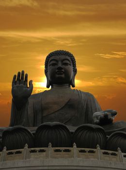 buddha and dramatic sunset