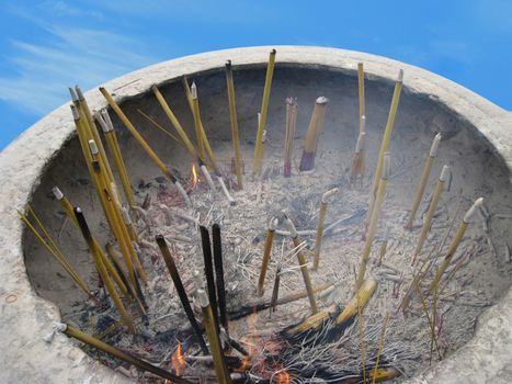 burning incense for buddhism religion