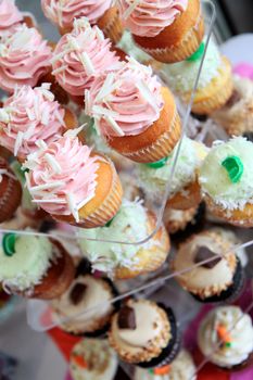 variety of flavors of cupcakes at bakery