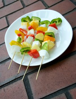 vegetarian kebab on wooden skewers