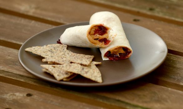 peanut butter and jelly wrap with tortilla chips