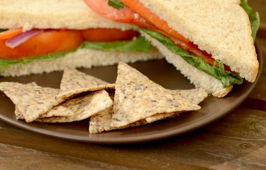 tortilla chips with a vegan sandwich