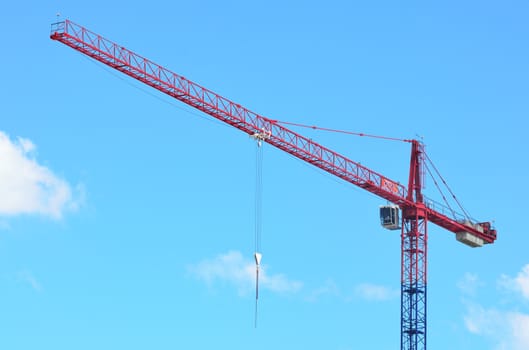 Red and blue construction crane 