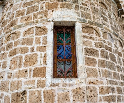 Old vitro church window in Greece