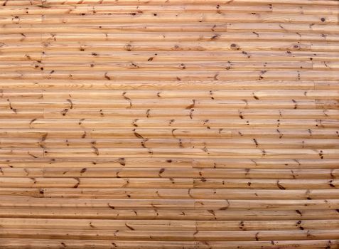 Detail of a house wall, lined with wooden building blocks-block house, lacquered