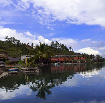 Reflections of Lake Toba. Island on North Sumatra, Indonesia.