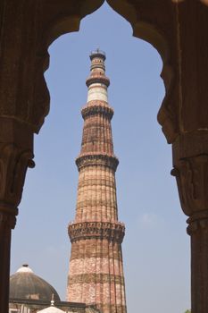 Qutb Minar. Ancient islamic mosque and victory tower. Delhi, India