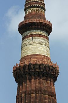 Stonework and marble decorating the Qutb Minar. Ancient islamic victory tower. Delhi, India