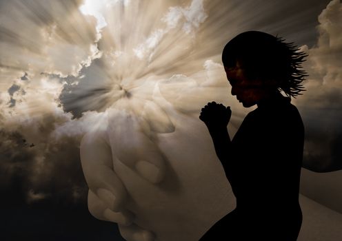Woman kneel praying in silhouette