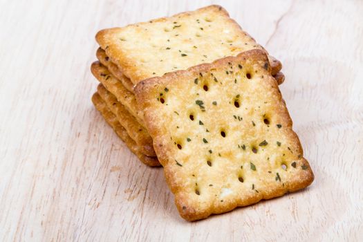 Vegetable cracker on wooden background