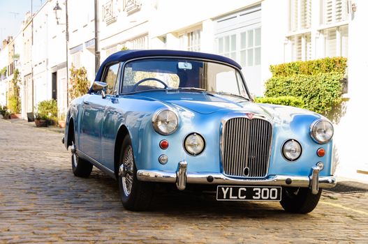 LONDON, UK - CIRCA MARCH 2012: A blue Alvis Three Litre TD21 convertible.