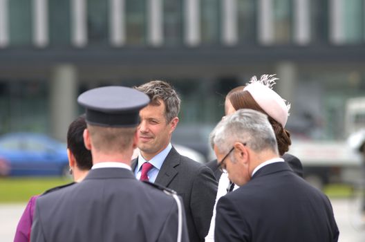 Warsaw, Poland - May 12, 2014: Danish Crown Prince Couple on state visit to Poland. Crown Prince Frederik during the wreath laying ceremony.