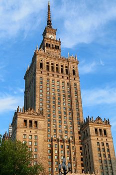 Palace of Culture and Science in city downtown of Warsaw, Poland. Monumental polish skyscraper. Historical architecture, socialism symbol.