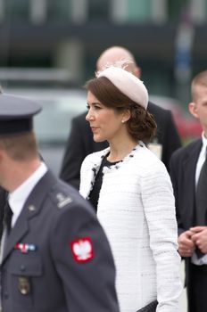 Warsaw, Poland - May 12, 2014: Danish Crown Prince Couple on state visit to Poland. Princess Mary Elizabeth waves during the wreath laying ceremony.