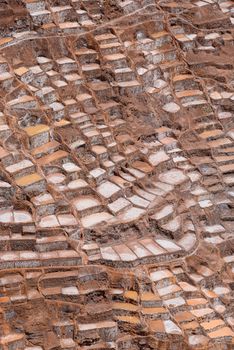 Inca ancient salt farm produced by evaporation in Peru