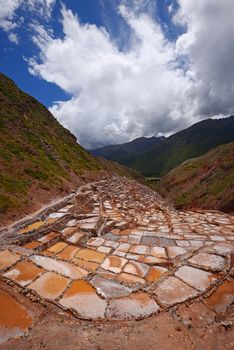 Inca ancient salt farm produced by evaporation in Peru