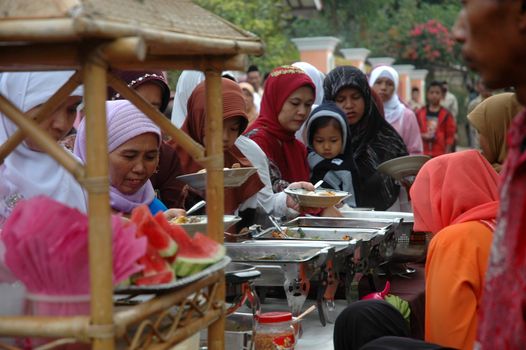 cikijing, west java, indonesia - july 10, 2011: guests at west java traditional wedding ceremonial