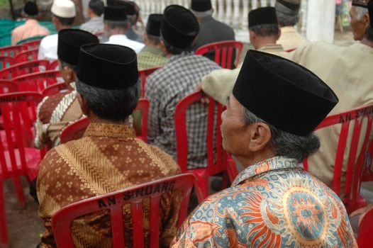 cikijing, west java, indonesia - july 10, 2011: senior guests at west java traditional wedding ceremonial