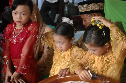 cikijing, west java, indonesia - july 10, 2011: guests at west java traditional wedding ceremonial