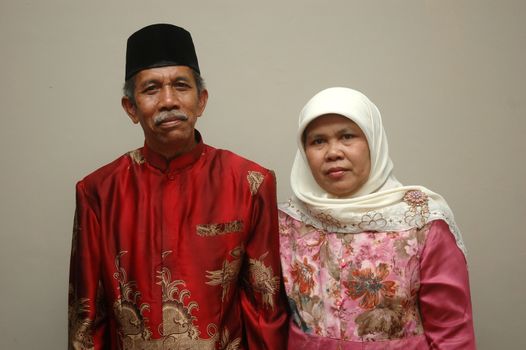 cikijing, west java, indonesia - july 10, 2011: senior couple wearing batik cloth