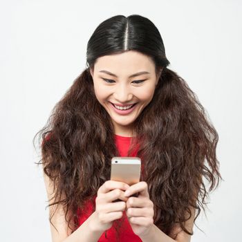 Charming pretty girl reading messages