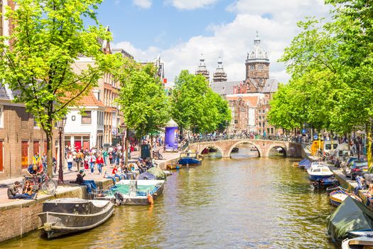 Amsterdam is the capital of the Netherlands and the canals and harbours fill a full quarter of the city surface.