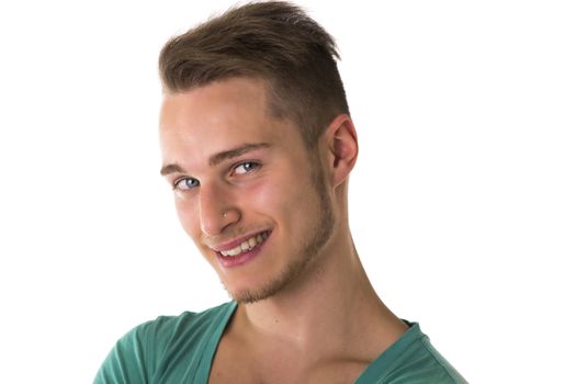Attractive blond, blue eyed young man smiling and looking at camera, isolated