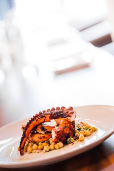 Cooked Octopus Plate with ChickPeas in a Portuguese Restaurant