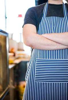 Cook Closeup in the Kitchen with Crossed arms in a Portuguese restaurant