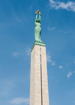 Monument of freedom in Riga unveiled in 1935 to honor fallen during Latvian War of Independence (1918 - 1920). Woman on the top is holding three stars which represent three regions of Latvia. 