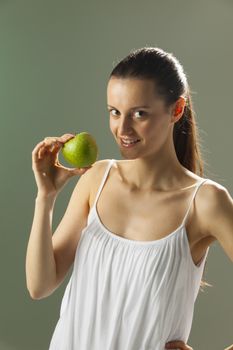 young woman with an apple