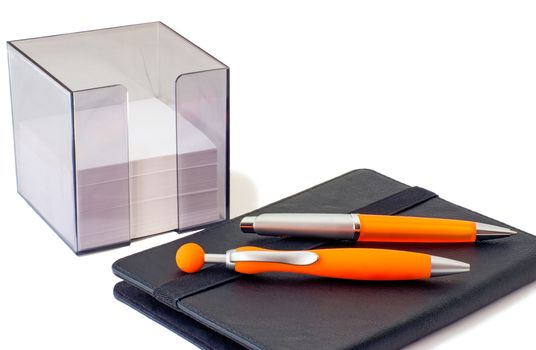 Two handles of bright orange color for the letter, a notebook and scratch paper in the container. Are presented on a white background.