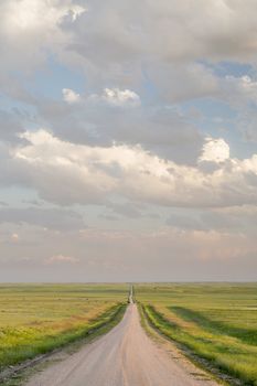 rural road in  eastern Colorado prairie in springtime, Pawnee National Grassland