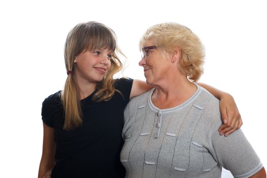 a young girl with her grandmother smiling