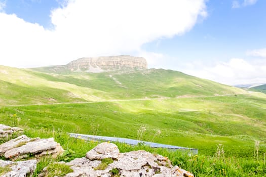 Summer landscape with Russian Caucasus green mountains