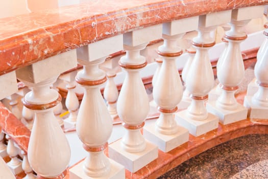 Phot of white and gold balustrade pattern