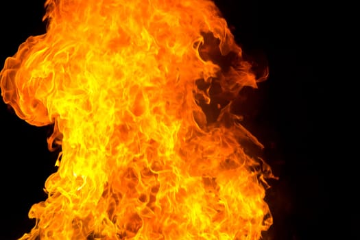 Photo with red flame on black background