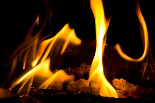 Photo with red flame on black background