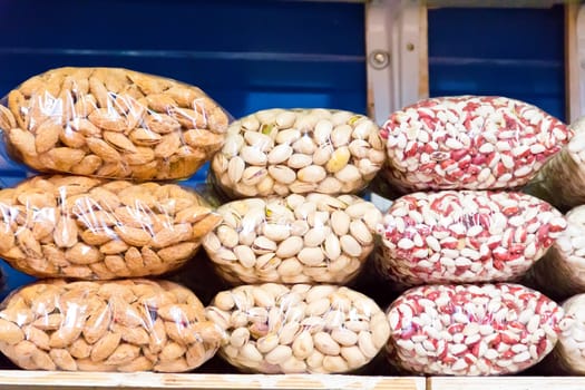 Photo of counter in market place with bean and nuts