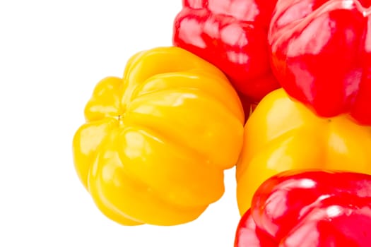 Photo of red and yellow raw pepper