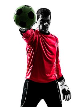 one caucasian soccer player goalkeeper man standing stopping ball with one hand in silhouette isolated white background