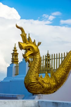 gold naga at Chiangrai temple,Thailand
