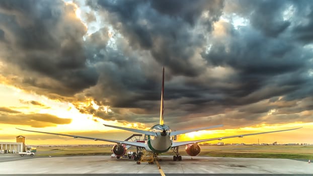 A plane being prepared for takeoff at an airport