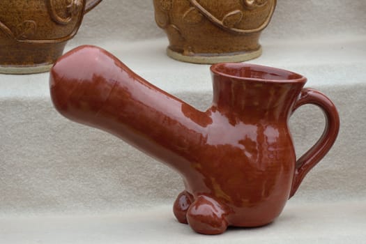 Phallic stoneware pot